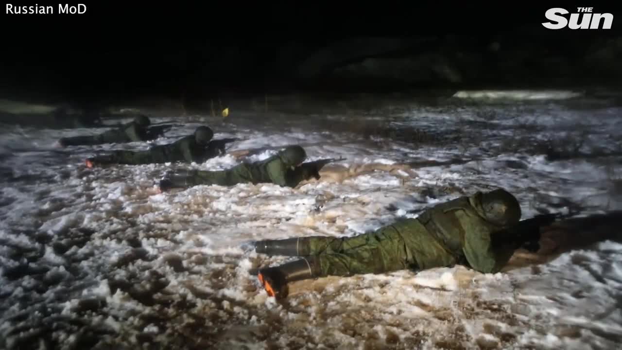 Russia's newly-enlisted soldiers fire rifles at night in stealth exercises