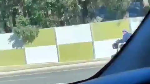 Australia - An old ‘Speed Demon’ Doing 80 km/h + (50 Miles per hour) on a Mobility Scooter