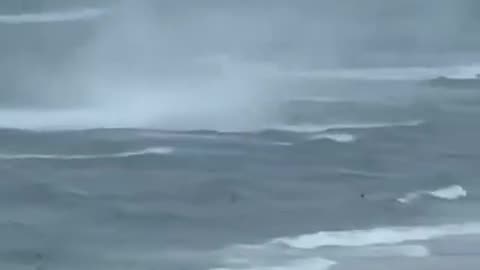 Footage Captures Waterspout Ripping Through Crowded Beach