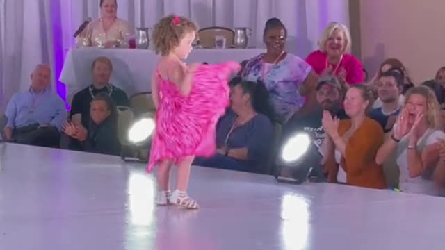 Little Girl Crashes a Fashion Show & Walks on Runway Like a Model