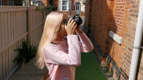 Blonde pritty photographer girl