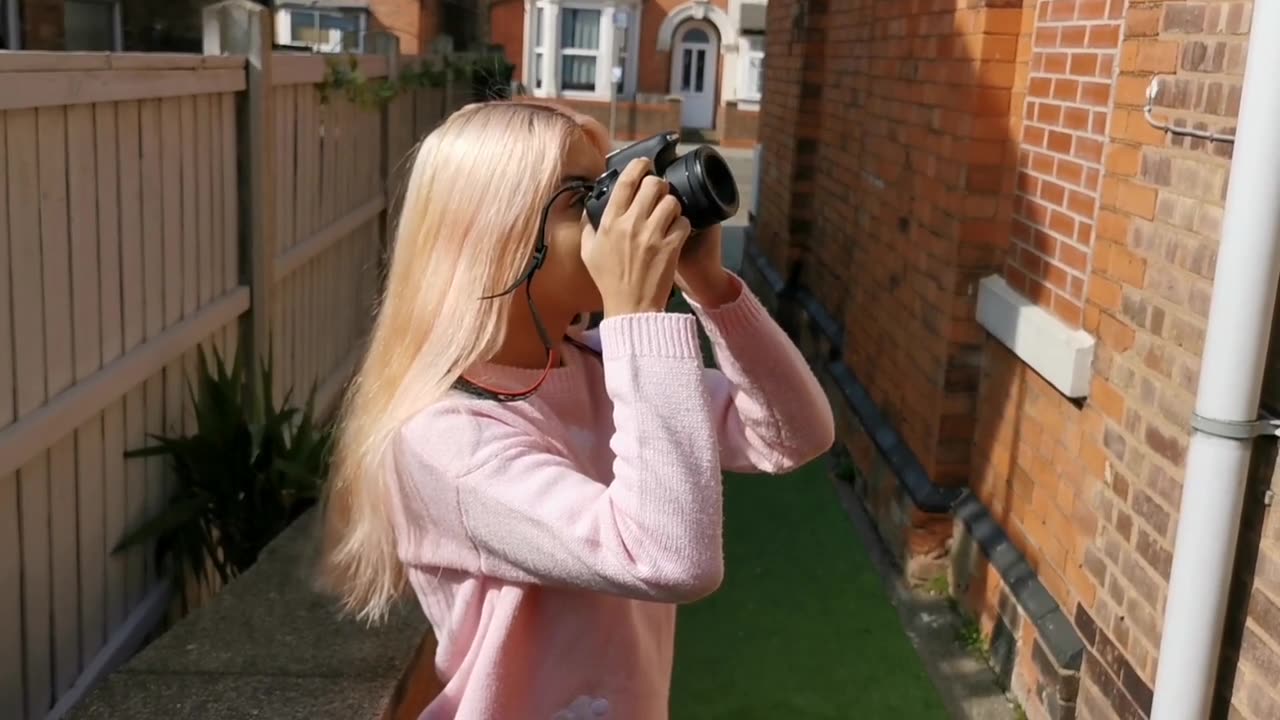 Blonde pritty photographer girl
