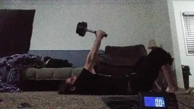 Laying sledgebell arm extended wrist deviation