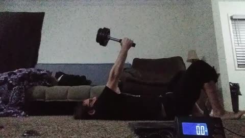 Laying sledgebell arm extended wrist deviation