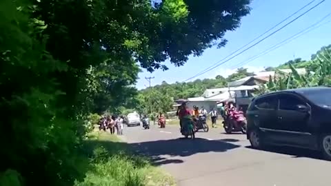 Indonesians flee into streets after powerful quake
