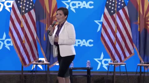 Kari Lake speaks to crowd before debate against Ruben Gallego