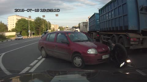 Biker Fails To Speed Through Traffic