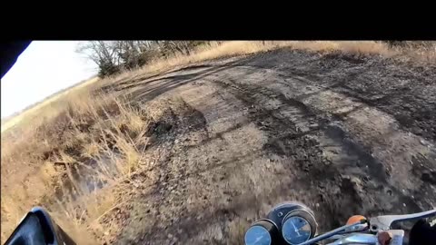 laying over a vintage motorcycle