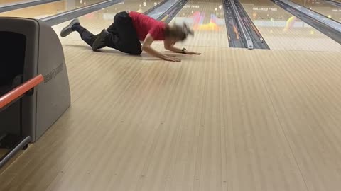 Bowler Faceplants While Nearly Getting a Strike