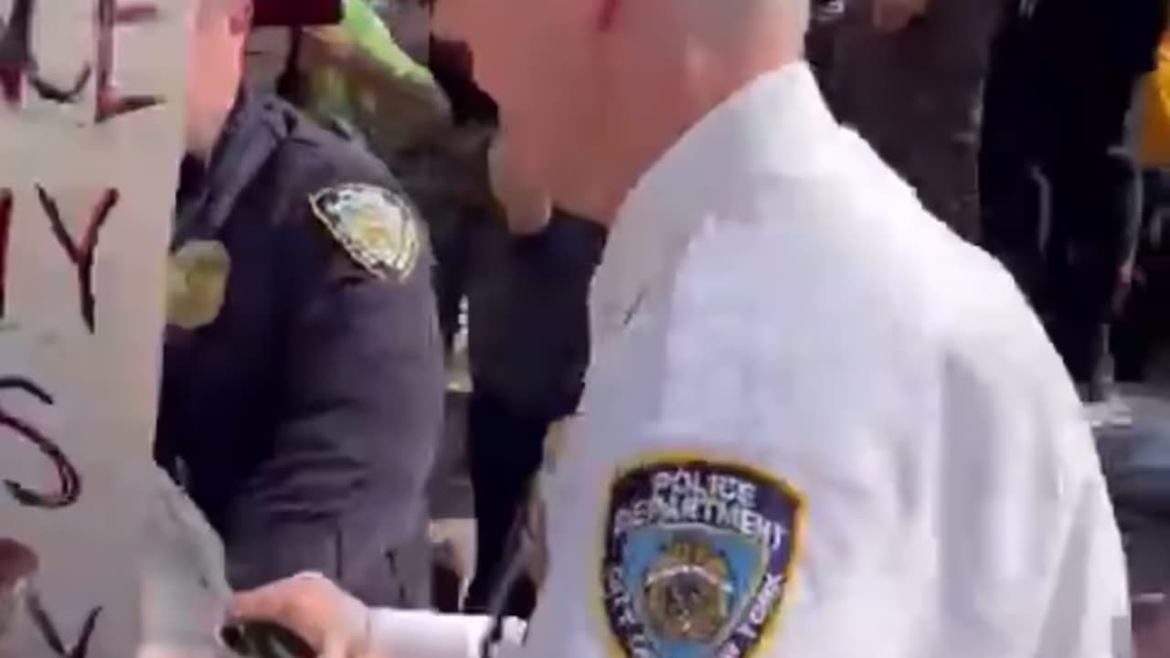 NYPD Deputy Chief Timothy Beaudette Shuts Down protester in his face