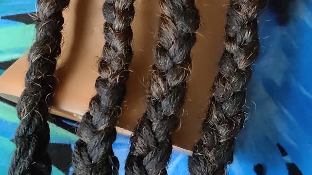 Learning How To Braid With Yarn