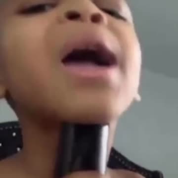 Kid uses grandmas voice box for auto tune