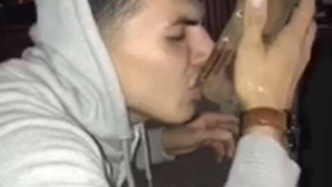 Guy drinks shot out of boat shoe