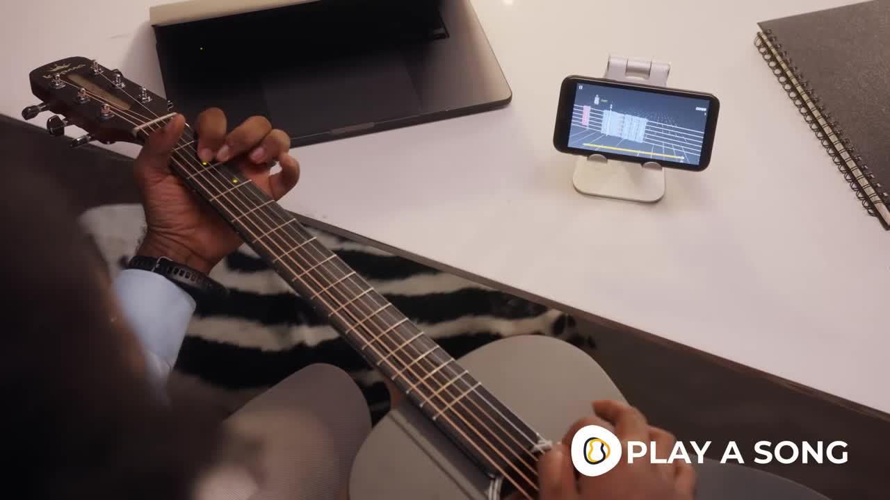 Poputar: A Smart Guitar with Free App for Everyone