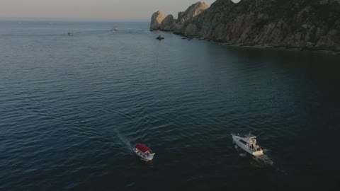 Ships sailing through the sea around an archipelago