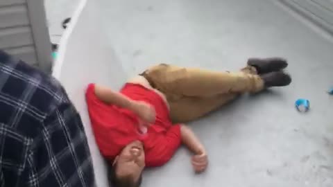 Guy tried breaking table but hits floor