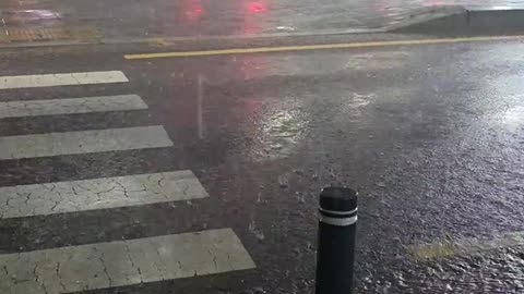 Heavy rain on the road