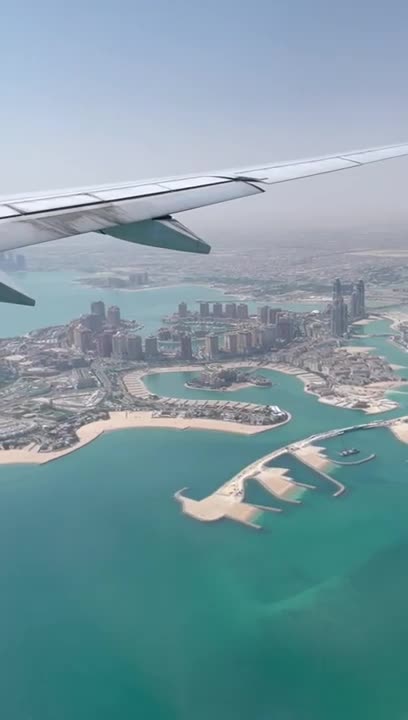 flying qatar on the way back from the airport