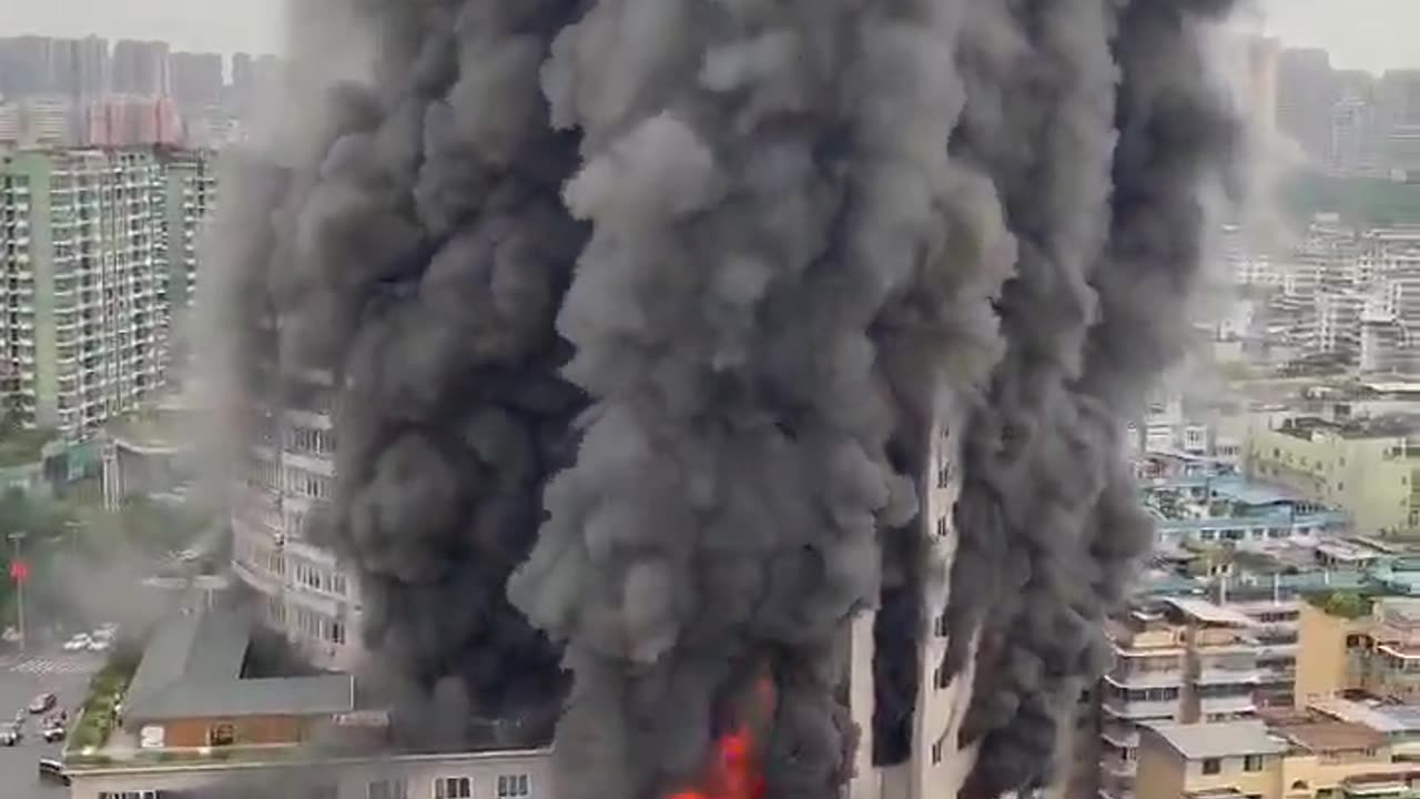 Massive fire reported at shopping center in southwest China.