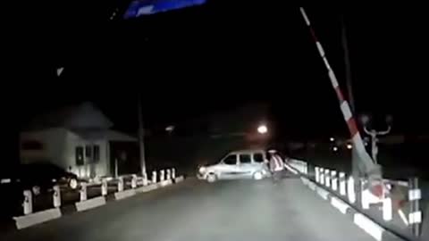 Car almost killed by train