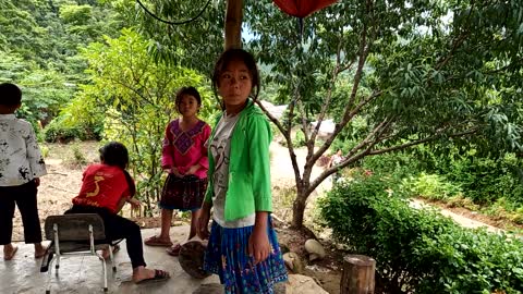 little children playing in the hut.