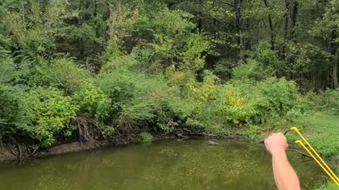 Shooting a balloon with a slingshot in air