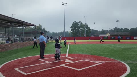 Brooks Chased Back to Third