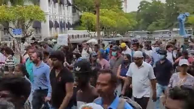 A group of protesters march towards the Presidential Secretariat in Sri Lanka