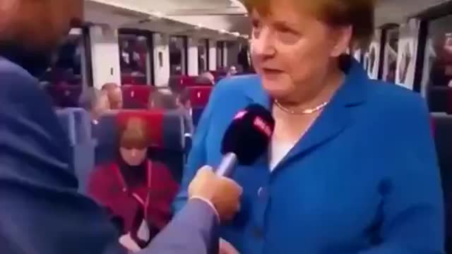 REPTILIAN EYES - ANGELA MERKEL (please see description for related info)
