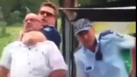 Australia CovidTyranny - 21 - Man handcuffed gets chocked out