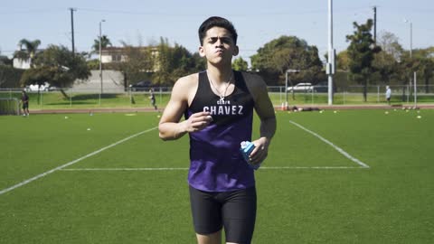 A Man Drinking while Running