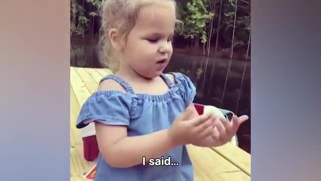 Funny baby in the zoo