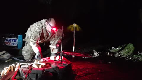 Making a cabin fire in a firepit