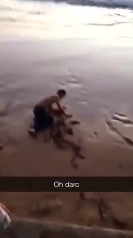 Shirtless skate down hill faceplant on beach