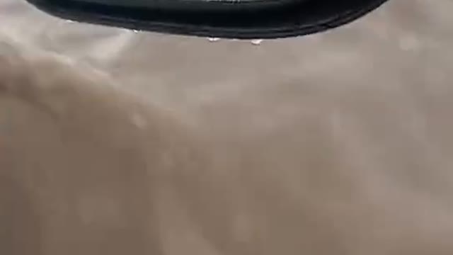 Driving car in flood