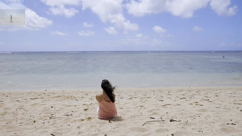 Sitting alone by the sea