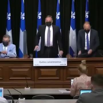 Quebec Premier François Legault flashes secret Satanic hand gesture
