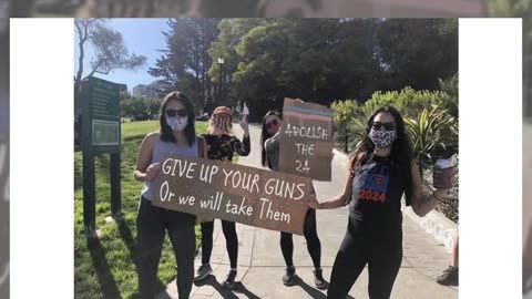 Fact Check: FAKE Photo Has Dem Supporters Holding 'Give Up Your Guns' And 'Abolish The 2A' Signs