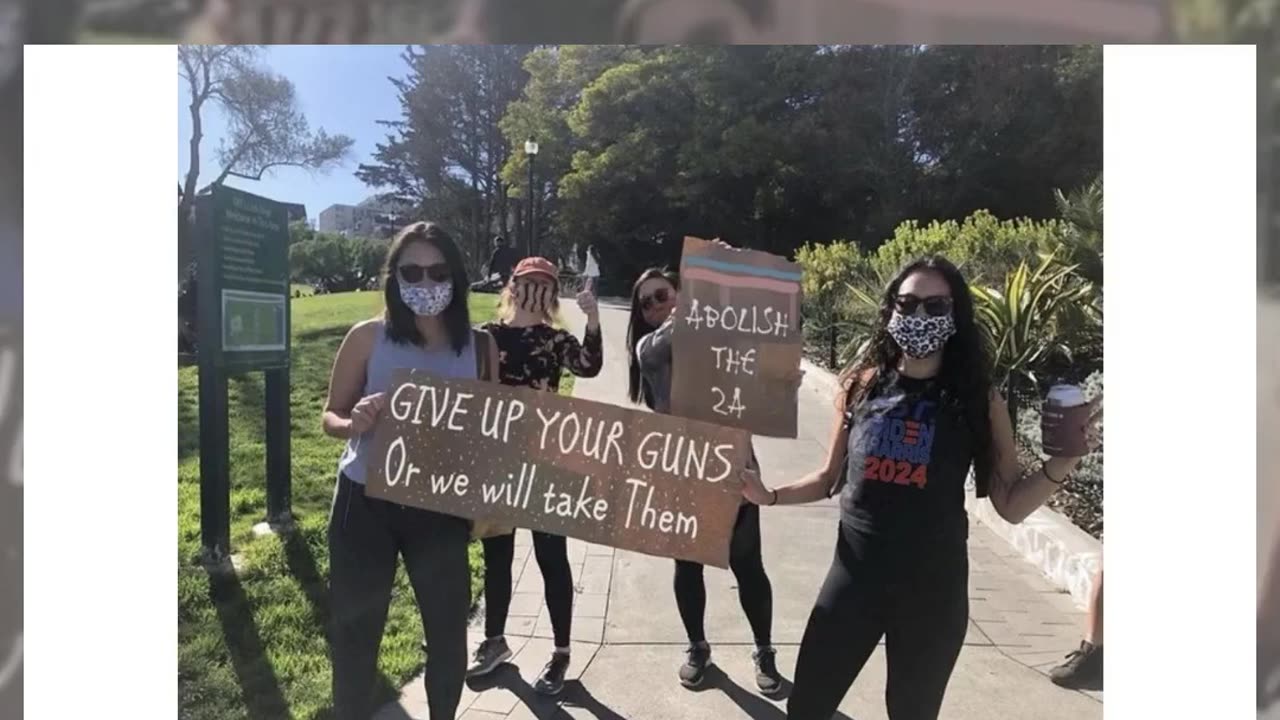 Fact Check: FAKE Photo Has Dem Supporters Holding 'Give Up Your Guns' And 'Abolish The 2A' Signs