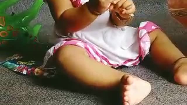 Sweet Baby children Playing with Toy