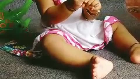 Sweet Baby children Playing with Toy