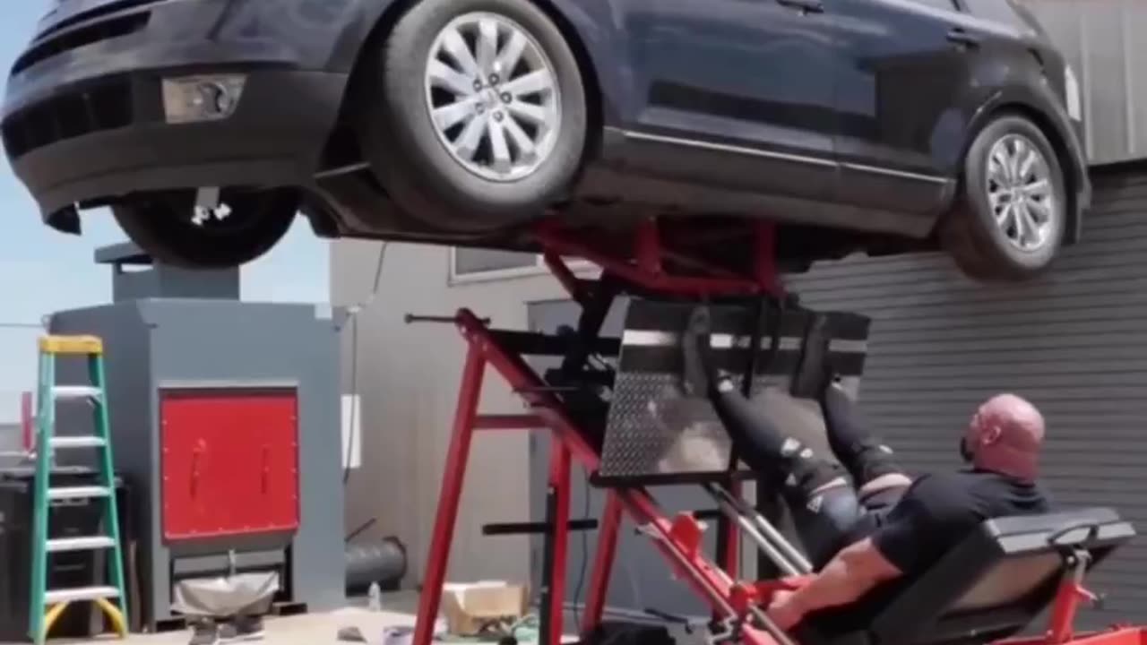 Leg Pressing A Car