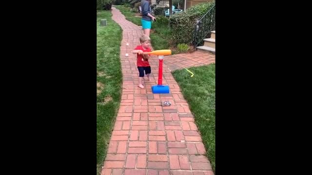 Baby Justin playing baseball