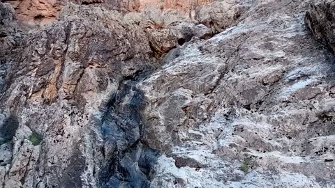 The flow of water from the mountain