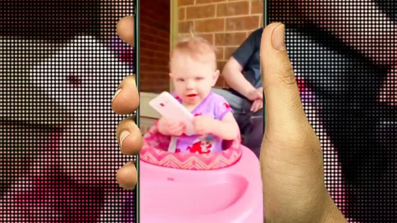 Funny babies dancing moment capture by mobile phone - cute baby dance video.