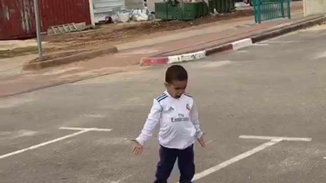 Kid pulls off soccer trick shot, celebrates like Ronaldo