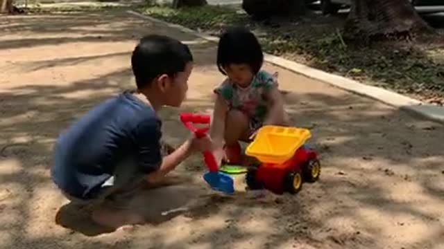 Playing sand Julie & PingAnn