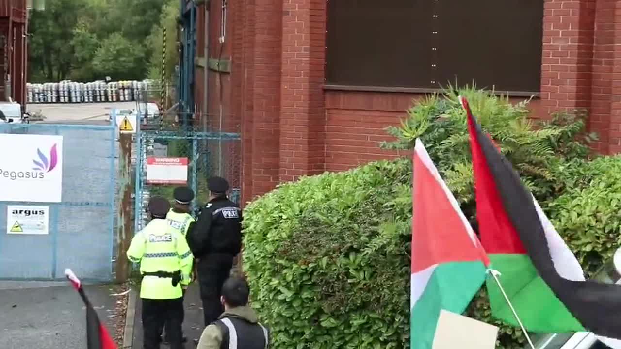 Pro-Palestine protesters stage a demonstration outside Manchester branch of Israeli defense company