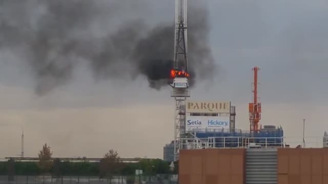 Watch This Burning Crane Collapse!