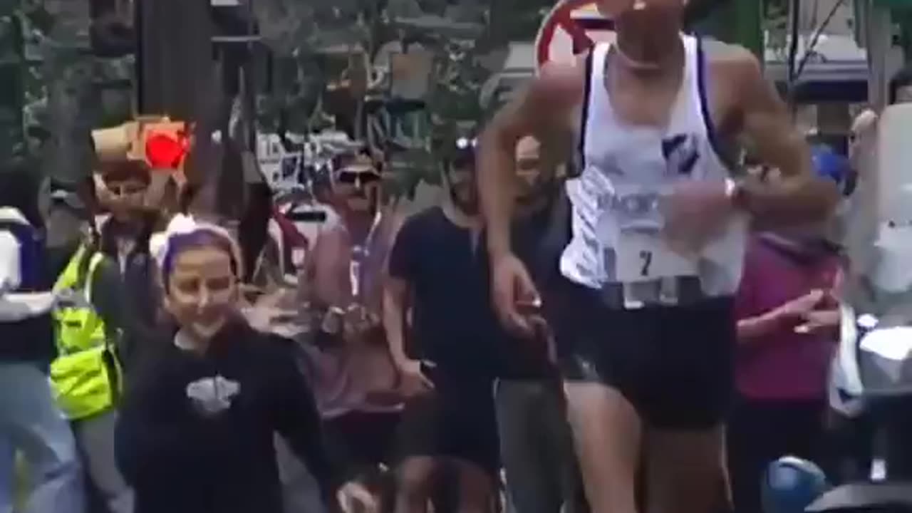 Little girl joins her father crossing the finish line